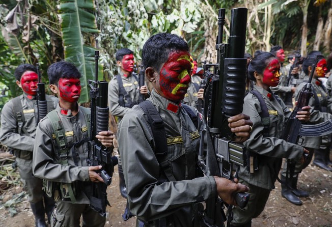 NPA fighters train in the Sierra Madre mountains of Luzon region. File photo: EPA