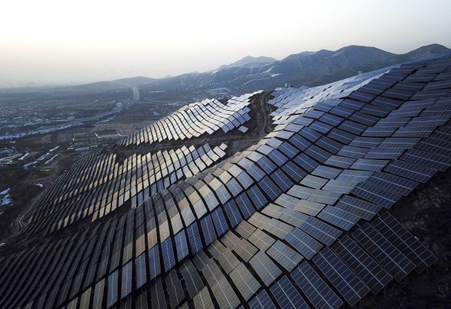 Solar panels cover hillsides in Zhangjiakou, in China’s northern Hebei province, on November 15, 2021. The country aims to get 25 of its power from renewable sources by 2030. Photo: AFP