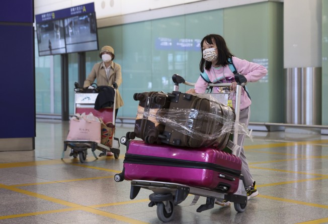 Passengers at Hong Kong International Airport. The flight suspension rule was previously eased in May. Photo: Edmond So