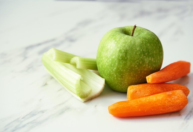 Fibrous foods like carrots, celery and apples are good for gut health and get your saliva flowing. Photo: Shutterstock