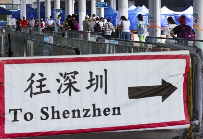 Travellers queue at Hong Kong’s Shenzhen Bay border crossing. Photo: K. Y. Cheng