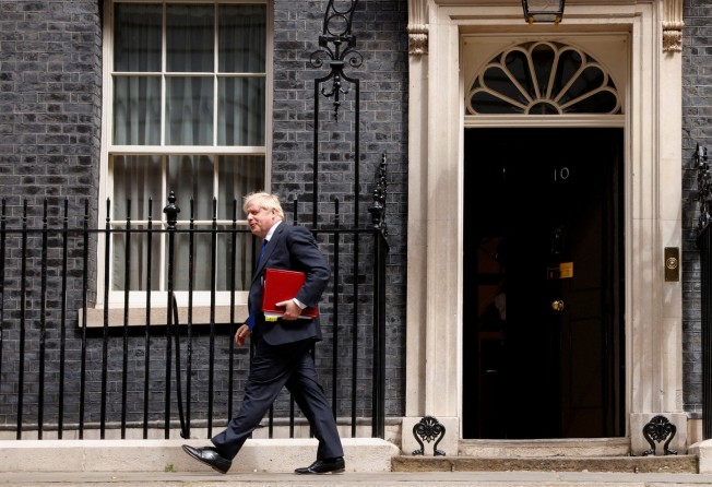 British PM Boris Johnson has decided to step down after dozens of ministers resigned over his conduct. Photo: Reuters