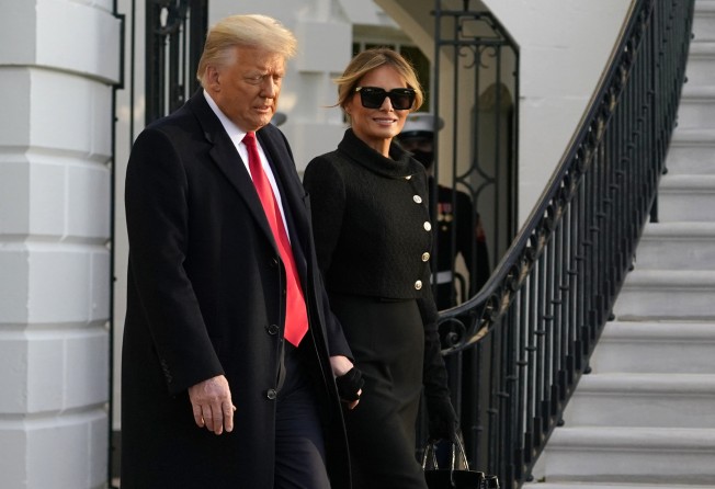 Former US president Donald Trump and former first lady Melania Trump walk to board Marine One on the South Lawn of the White House, in January 2021, in Washington DC. Photo: AP