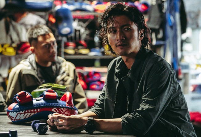 Nicholas Tse (front) and Yo Yang in a still from Raging Fire.