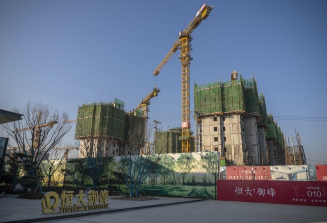 Unfinished apartment buildings at the construction site of a China Evergrande Group development in Beijing on January 6, 2021. Photo: Bloomberg