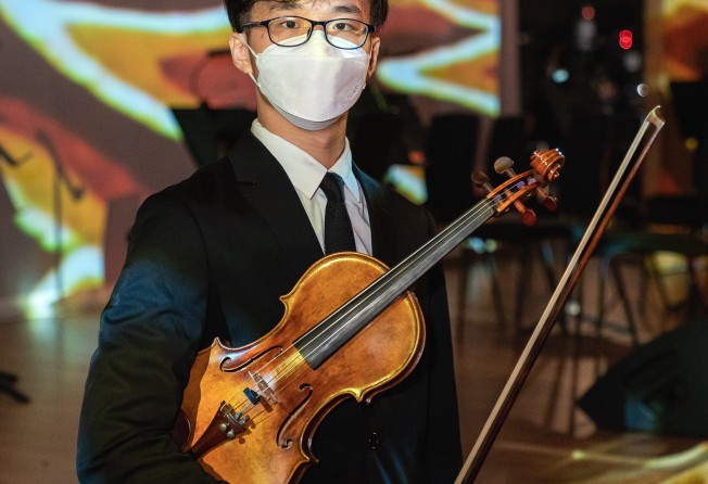 Student Chan Tin-yan took part in the AI concert at City Hall in Central, Hong Kong. Photo: Hong Kong Baptist University