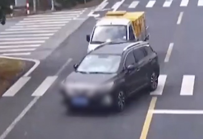 At one point during their drive that was captured on camera, the boy narrowly avoided a collision with another car. Photo: Baidu
