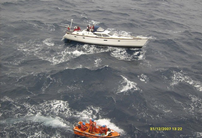 Carolyn Lee’s boat and crew awaiting rescue on the way from the Philippines to Hong Kong in 2007. Photo: Carolyn Lee