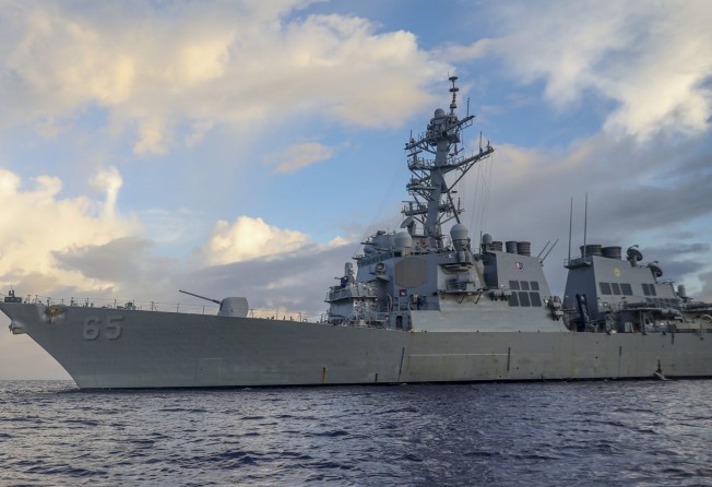 The USS Benfold conducts what Washington describes as a “routine freedom of navigation operation” in the South China Sea on June 24. Photo: US Navy via AP