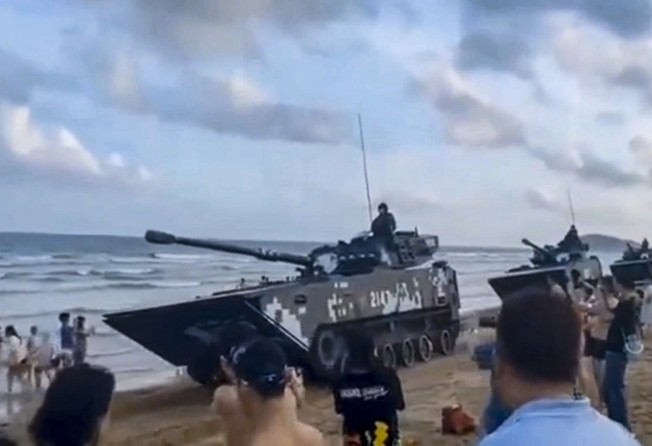 Social media users shared images of Chinese Type 63A light ampibious tanks on a beach in Xiamen. Photo: Weibo