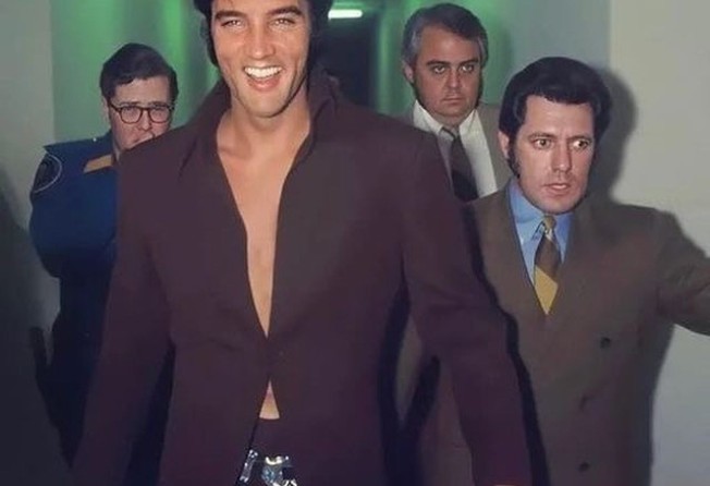 A younger Elvis Presley walks through the International Hotel in Las Vegas, in 1969. Photo: @jmhound/Instagram