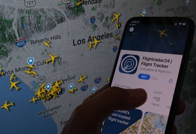 The Flightradar24 app is seen on a smartphone. Photo: AFP