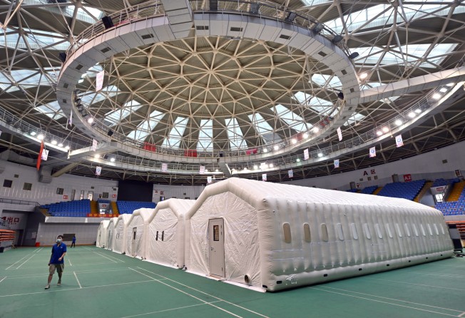 Temporary inflatable Covid-19 testing labs are seen erected in a sports hall in Sanya on Sunday last week. Photo: Xinhua