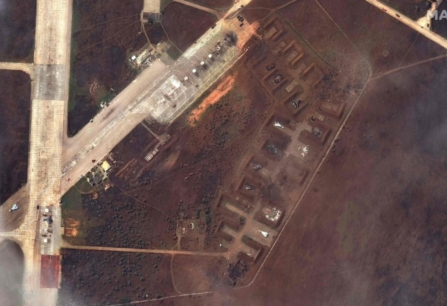 A satellite image shows the aftermath of a reported attack on the Saki airbase at Novofedorivka, Crimea. Image: Maxar Technologies via AFP