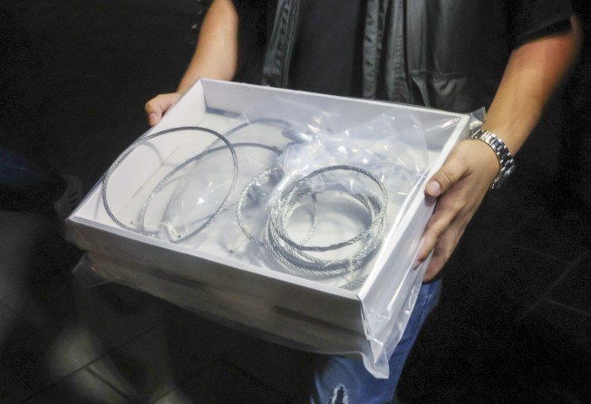 Police seized several wires as evidence after a giant video screen crashed onto the stage. Photo: Edmond So