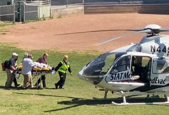 Salman Rushdie is loaded onto a medical evacuation helicopter after being stabbed at an event in Chautauqua, New York, on Friday. Photo: AFP via Horatio Gates