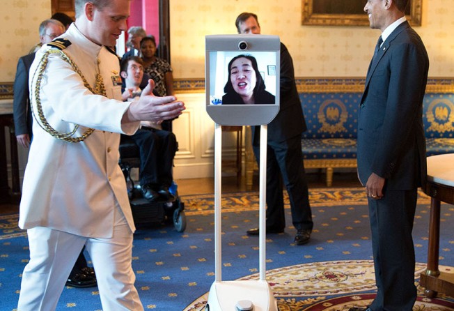 Alice Wong participates in an event in 2015 with then US president Barack Obama of the 25th anniversary of the Americans With Disabilities Act via robot. Photo: The White House