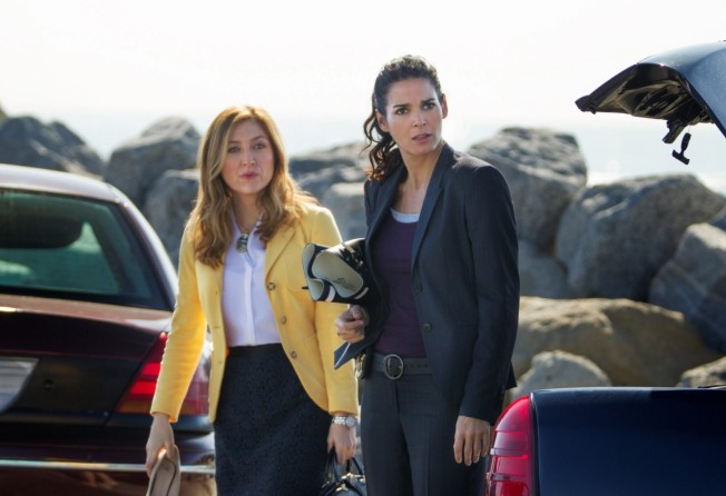 Angie Harmon (right) as police detective Jane Rizzoli and Sasha Alexander as medical examiner Dr Maura Isles in the television adaptation of Gerritsen’s crime fiction. Photo: TNT