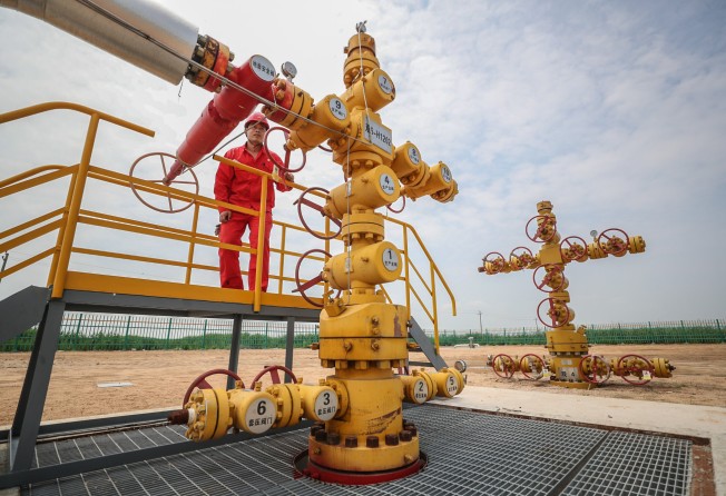 A staff member inspects equipment at a gas storage area of PetroChina in Panjin, Liaoning province. Photo: Xinhua