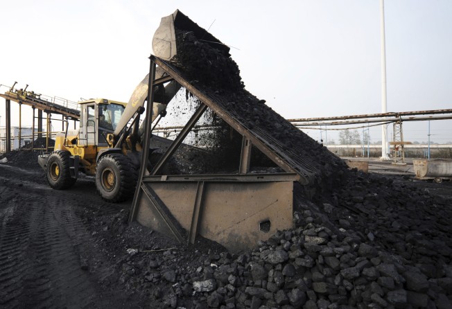 A worker use heavy machinery at a coal mine in Huaibei, Anhui province. Chinese President Xi Jinping announced in April that the country would in 2026 start phasing out the consumption of coal. Photo: Chinatopix via AP