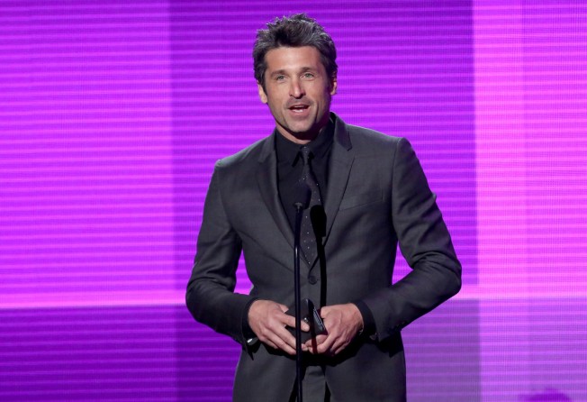 Patrick Dempsey presents the award for pop/rock band, duo or group on stage at the 42nd annual American Music Awards in Los Angeles. Photo: Invision/AP
