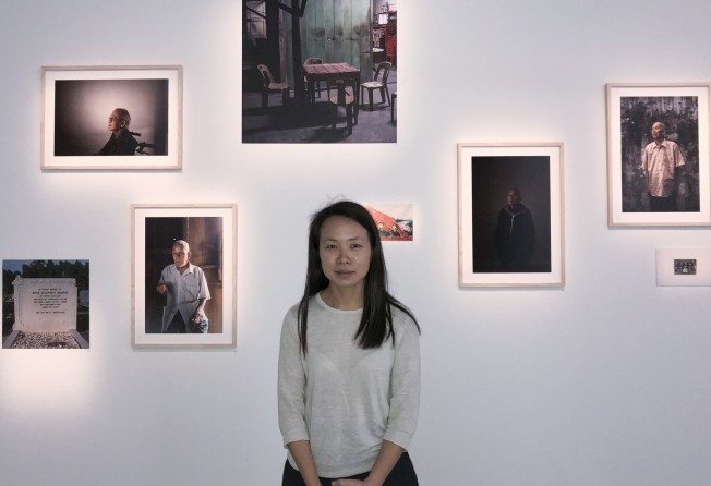 Photojournalist and artist Sim Chi Yin at her exhibition on the Malayan Emergency in January 2018. She was inspired by her late grandfather’s experience to look into the large-scale deportation of ethnic Chinese Malayans by the British from 1948 to 1960. Photo: Enid Tsui