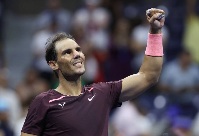 Nadal celebrates after defeating Fabio Fognini during their men’s singles second round match. Photo: AFP