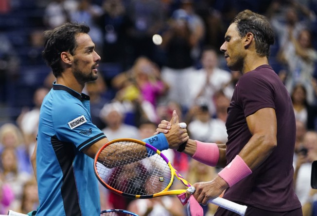 Nadal shakes hands with Fabio Fognini after defeating him during the second round of the US Open. Photo: AP