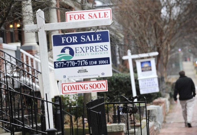 Signs marking houses for sale in Washington in January 2010. The US managed to recover from the collapse of the subprime mortgage market with a partial nationalisation of the distressed assets of banks. Photo: Reuters