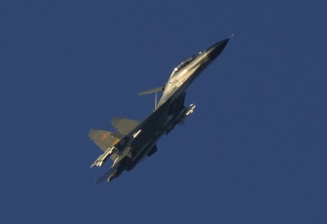 A Chinese J-11 military fighter jet flies above the Taiwan Strait near Pingtan in southeastern China’s Fujian province on August 5, 2022. Photo: AP