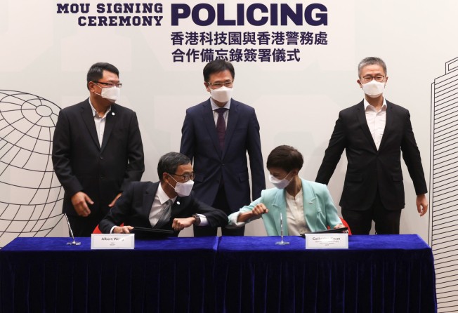 Police and technology experts sign a groundbreaking deal to examine ways to boost police capabilities with the latest in gadgets. Photo Jonathan Wong