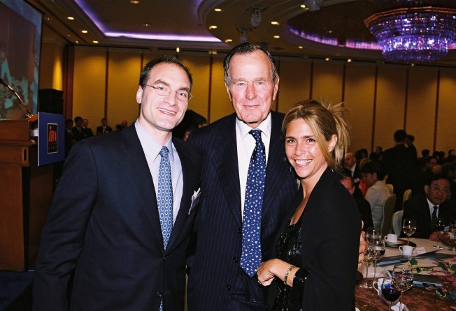 Robert Kissel, former US president George H Bush and Nancy Kissel in 2003. Photo: courtesy of William Kissel