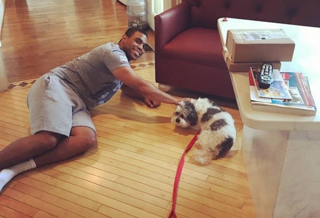 Amir Jabron Tyson and his dog, who passed away in 2018. Photo: @amir_j_tyson/Instagram