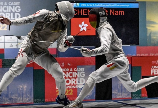 Cheng Tit-nam (left) in action at the junior World Championships in Dubai. Photo: FIE