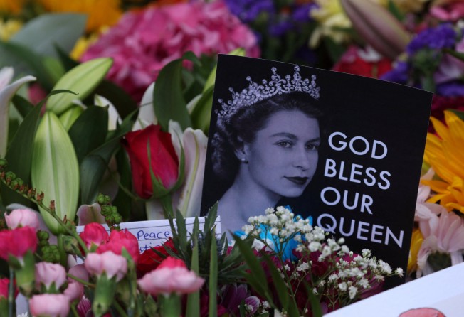Cards and flowers are laid out following the death of Britain’s Queen Elizabeth, in Balmoral, Scotland, UK on Saturday. Photo: Reuters