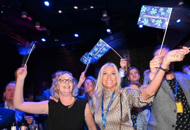 Supporters of the Sweden Democrats cheer during the party’s election night in Nacka, near Stockholm, Sweden on Sunday. Photo: AFP