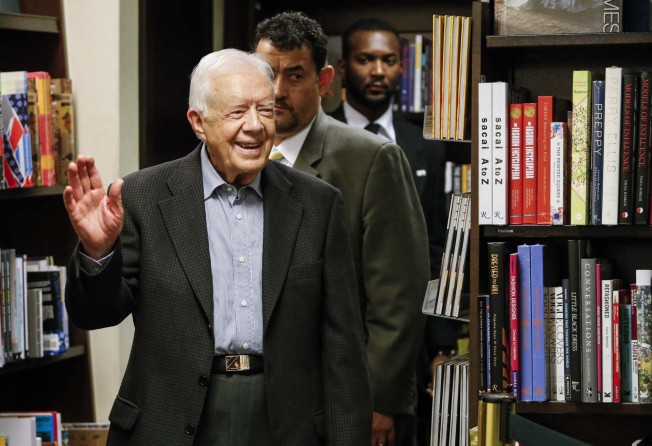 Former US President Jimmy Carter arrives to sign his new book, A Full Life: Reflections at Ninety, in New York, July 2015. Photo: AFP
