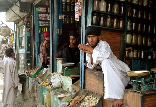 Sikhs wait for customers at their shops in Kabul, Afghanistan. File photo: AP