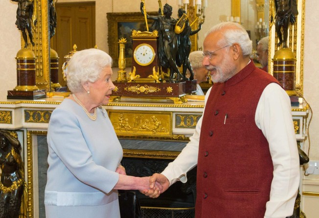 Britain’s Queen Elizabeth and India’s Prime Minister Narendra Modi in London in 2015. He is not attending her funeral. Photo: AFP