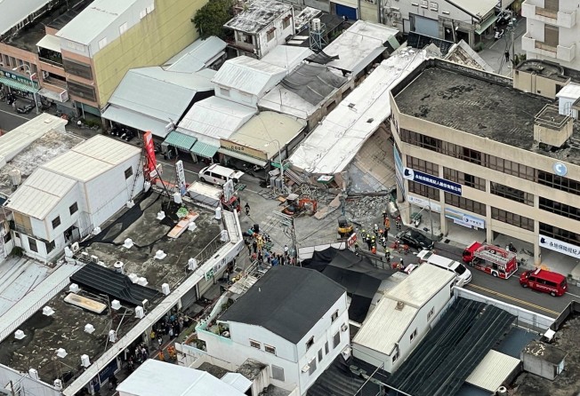 The 6.8-magnitude earthquake brought down a building in Yuli, Hualien county, on Sunday. Photo: Reuters