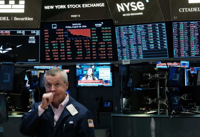 A trader works on the floor of the New York Stock Exchange (NYSE) in August 2022. The Fed will still have two more policy meetings this year. Photo: AFP