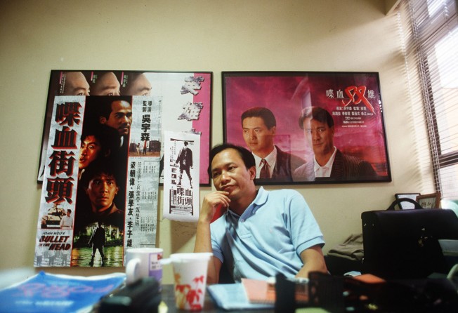 John Woo in his Hong Kong office, pictured in 1993. Photo: SCMP.
