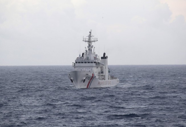 Philippine Coast Guard personnel on patrol in the disputed South China Sea earlier this month. Photo: EPA-EFE