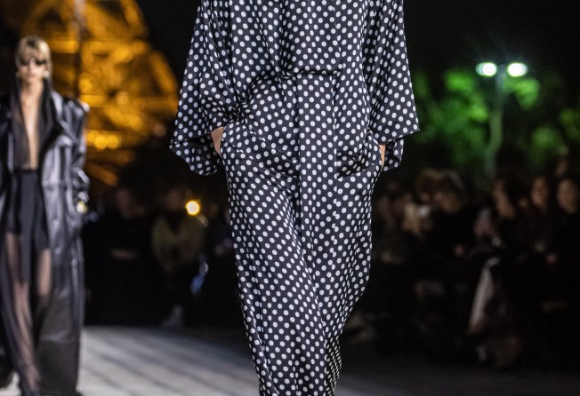 Models mainly wore monochrome looks with occasional print for the spring/summer 2023 ready-to-wear collection by Saint Laurent fashion house during the Paris Fashion Week, in Paris, France, on September 27. Photo: EPA-EFE