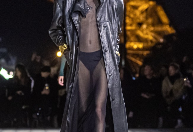 An all-black ensemble worn by a model for the spring/summer 2023 ready-to-wear collection by Saint Laurent fashion house during the Paris Fashion Week, in Paris, France, on September 27. Photo: EPA-EFE