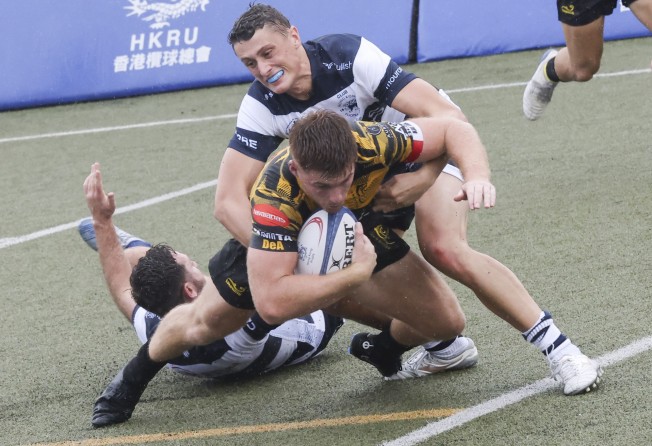 Tomos Howells’ try ensured USRC Tigers led at half-time against Football Club on Saturday. Photo: Jonathan Wong