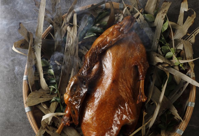 The Chairman will continue to serve its signature camphor-wood-smoked goose at the new location. Photo: The Chairman