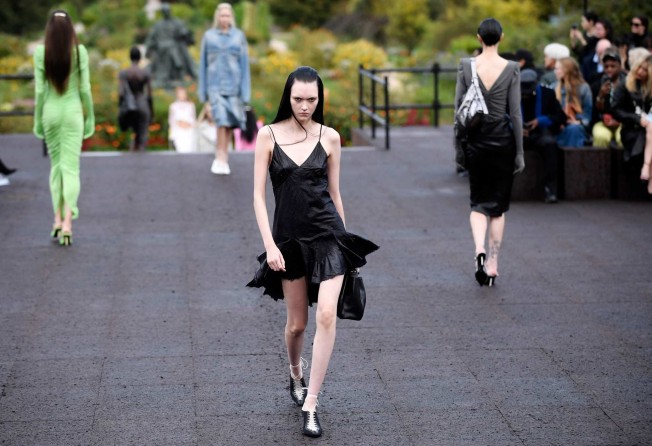 A black dress is presented for Givenchy during the spring-summer 2023 fashion show as part of the Paris Womenswear Fashion Week, in Paris, on October 2. Photo: AFP