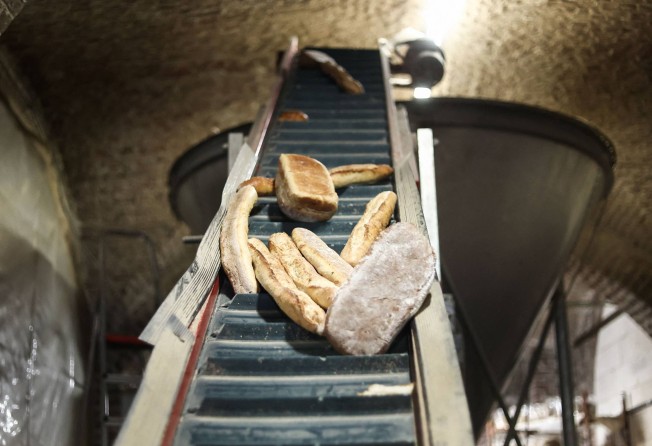 Surplus bread, along with brewers’ grains, is used by Eclo to produce substrates to grow organic mushrooms. Photo: AFP