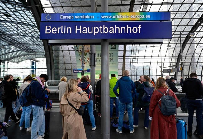 Rail passengers wait at the main train station in Berlin following major disruption on Germany’s railway network. Photo: AFP